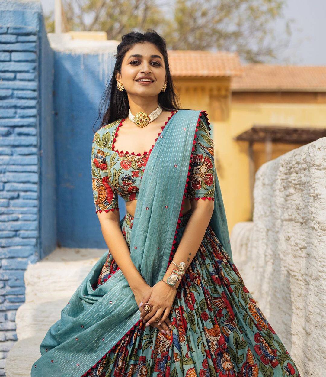 Aqua Blue & Rust Red Ethereal Bloom Kalamkari Lehenga Choli Set